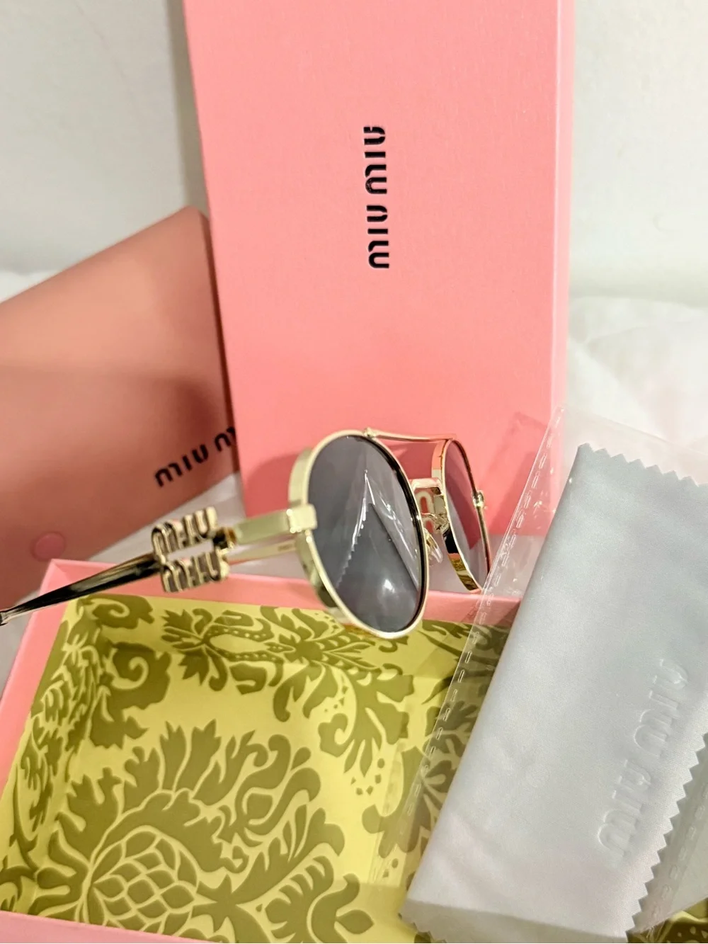 Miu Miu Gold Frame Black Lens Sunglasses with Pink Case